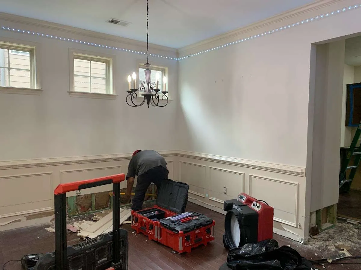 Restoration technician with professional equipment in Fairhope